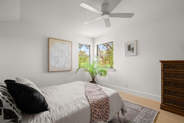 4328 Far W Blvd, Austin, TX 78731 - bedroom featuring baseboards, ceiling fan, and wood finished floors