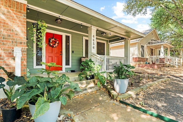 4456 Mather, Kyle, TX 78640 - property entrance with covered porch and brick siding
