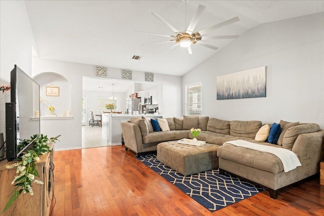 4456 Mather, Kyle, TX 78640 - living area with ceiling fan, plenty of natural light, vaulted ceiling, and hardwood / wood-style flooring
