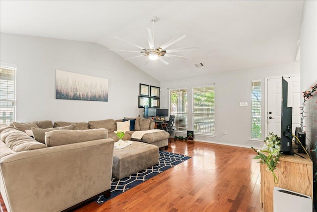4456 Mather, Kyle, TX 78640 - living area featuring lofted ceiling, wood finished floors, ceiling fan, and baseboards