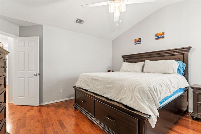 4456 Mather, Kyle, TX 78640 - bedroom featuring vaulted ceiling, wood finished floors, baseboards, and ceiling fan