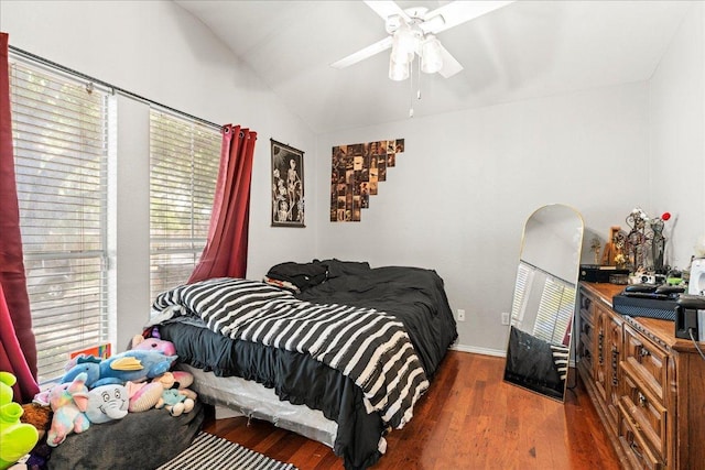4456 Mather, Kyle, TX 78640 - bedroom with wood finished floors, vaulted ceiling, a ceiling fan, and baseboards