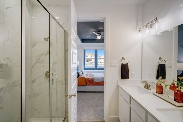 2031 Cora Ivy Ln, Round Rock, TX 78665 - bathroom featuring ensuite bathroom, a ceiling fan, a marble finish shower, and double vanity