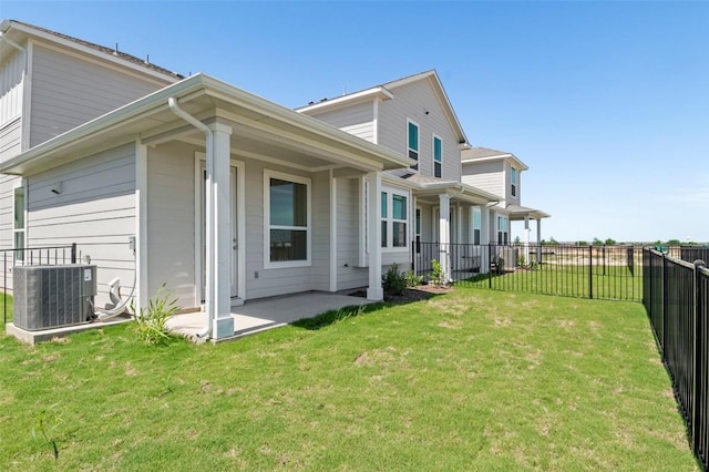 2031 Cora Ivy Ln, Round Rock, TX 78665 - rear view of property with central air condition unit and a patio area