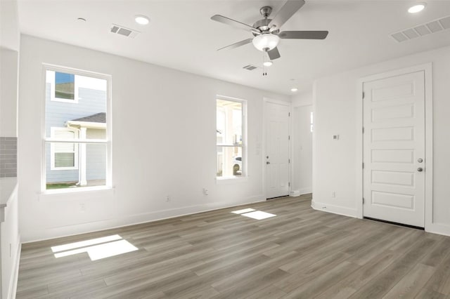 2031 Cora Ivy Ln, Round Rock, TX 78665 - unfurnished bedroom with light wood-style floors, recessed lighting, baseboards, and a ceiling fan
