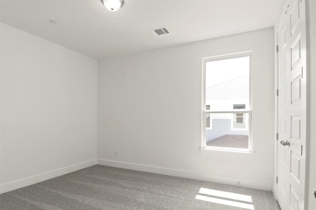 2031 Cora Ivy Ln, Round Rock, TX 78665 - spare room featuring baseboards and light carpet