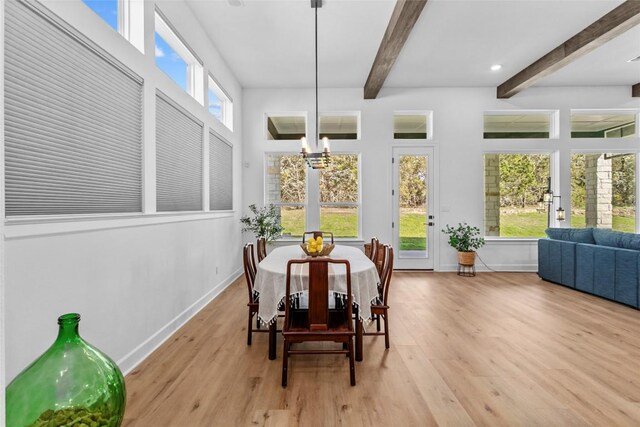 1890 Headwaters Blvd, Dripping Springs, TX 78620 - sunroom / solarium featuring beam ceiling and a chandelier