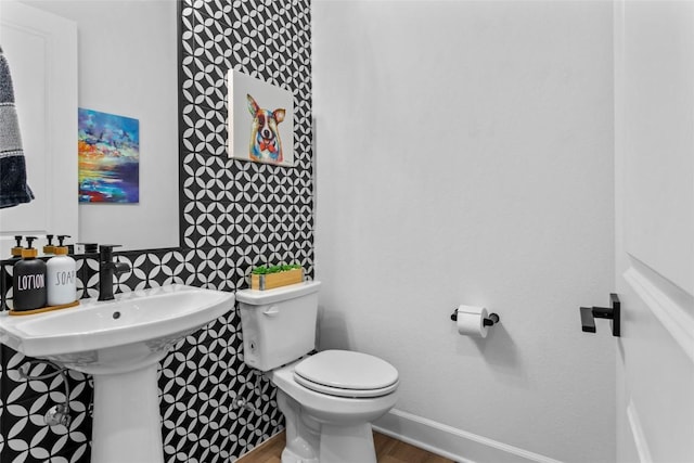 1890 Headwaters Blvd, Dripping Springs, TX 78620 - half bathroom with toilet and wood finished floors