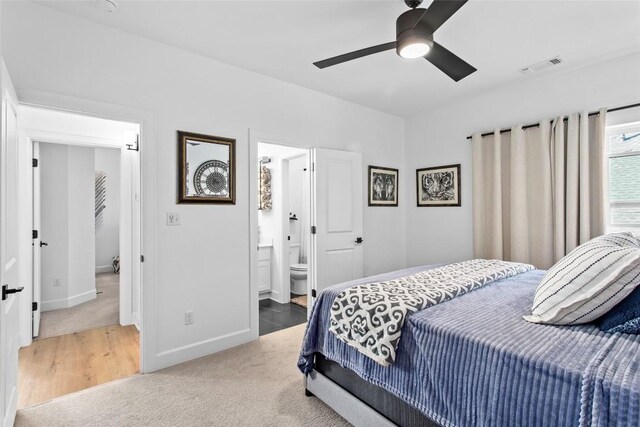 1890 Headwaters Blvd, Dripping Springs, TX 78620 - bedroom featuring carpet floors, ensuite bathroom, and a ceiling fan