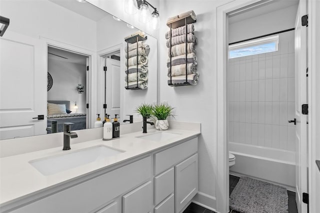 1890 Headwaters Blvd, Dripping Springs, TX 78620 - bathroom with double vanity, ensuite bath, bathtub / shower combination, and tile patterned floors