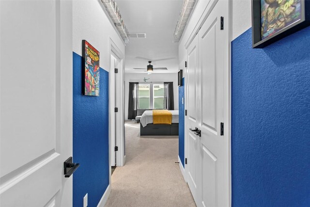 1890 Headwaters Blvd, Dripping Springs, TX 78620 - hallway featuring carpet and a textured wall
