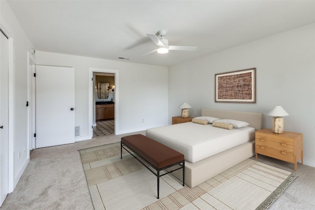 3004 Boone Dr, Lago Vista, TX 78645 - bedroom featuring carpet, ensuite bath, and ceiling fan
