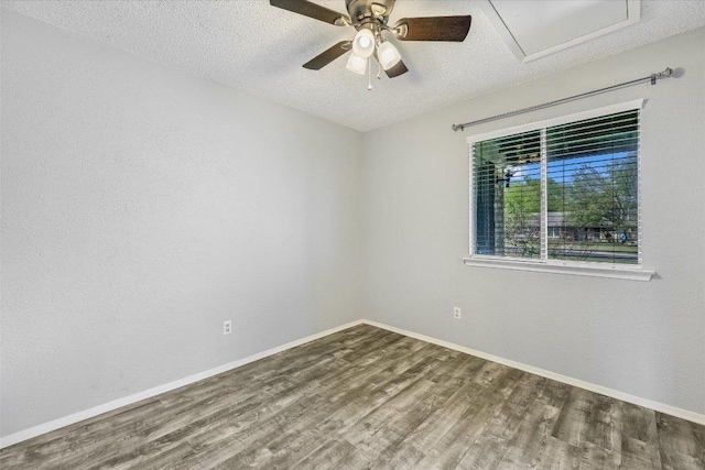 317 W William Cannon Dr B, Unit A, Austin, TX 78745 - spare room with a ceiling fan, wood finished floors, a textured ceiling, and baseboards