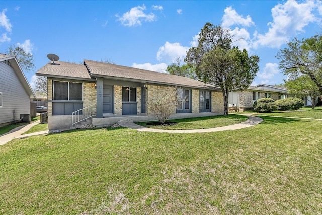 317 W William Cannon Dr B, Unit A, Austin, TX 78745 - single story home featuring a front yard, central AC unit, and stone siding