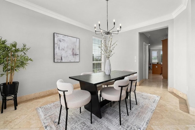 6611 Yaupon Dr, Austin, TX 78759 - dining room with a chandelier, crown molding, and light tile patterned flooring