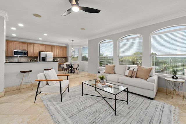 6611 Yaupon Dr, Austin, TX 78759 - living area with crown molding, ceiling fan, recessed lighting, and light tile patterned floors