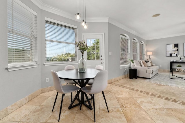 6611 Yaupon Dr, Austin, TX 78759 - dining room featuring crown molding and tile patterned flooring