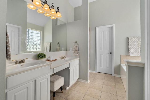 6611 Yaupon Dr, Austin, TX 78759 - full bathroom with double vanity, a garden tub, tile patterned floors, and high vaulted ceiling