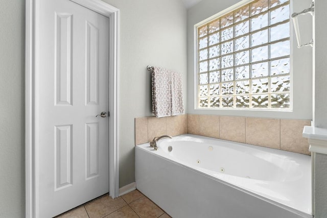 6611 Yaupon Dr, Austin, TX 78759 - full bathroom featuring a tub with jets and tile patterned floors