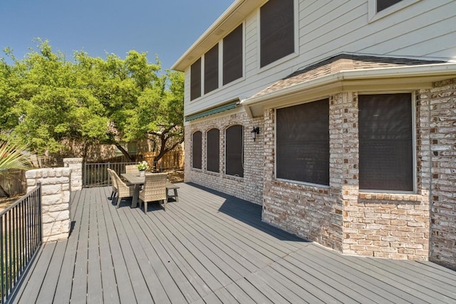 6611 Yaupon Dr, Austin, TX 78759 - wooden deck with outdoor dining area
