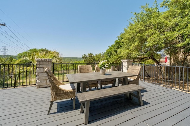 6611 Yaupon Dr, Austin, TX 78759 - wooden terrace with outdoor dining space