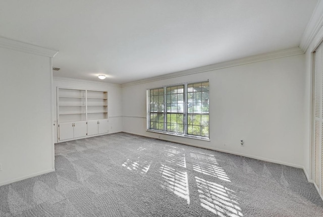 1700 Barton Hills Dr, Austin, TX 78704 - spare room with carpet flooring, crown molding, and built in features