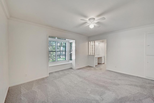 1700 Barton Hills Dr, Austin, TX 78704 - carpeted empty room featuring crown molding and ceiling fan