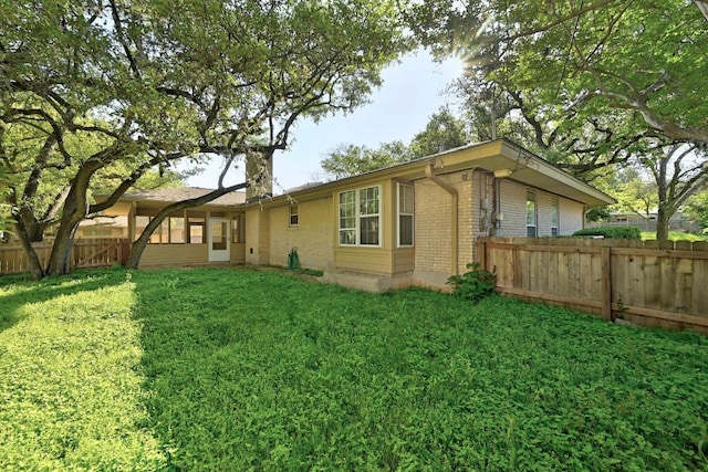 1700 Barton Hills Dr, Austin, TX 78704 - rear view of house with brick siding