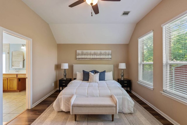 3610 Turkey Path Bnd, Cedar Park, TX 78613 - bedroom featuring wood finished floors, vaulted ceiling, connected bathroom, and ceiling fan