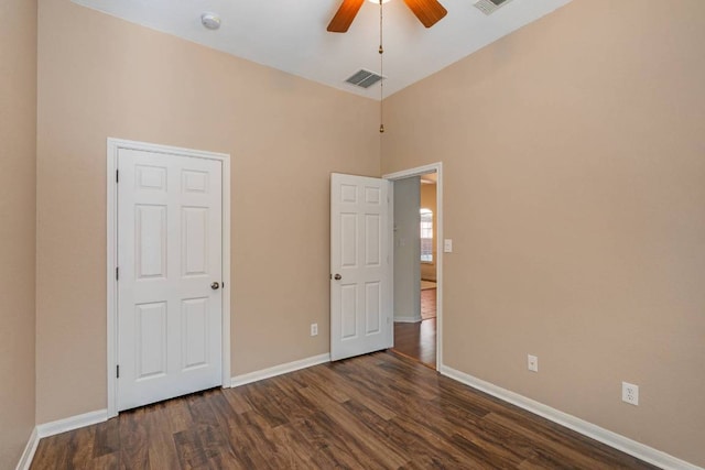 3610 Turkey Path Bnd, Cedar Park, TX 78613 - unfurnished bedroom with dark wood-style flooring, a high ceiling, and a ceiling fan