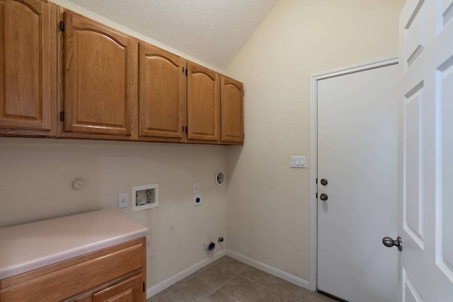 3610 Turkey Path Bnd, Cedar Park, TX 78613 - washroom with hookup for a gas dryer, cabinet space, electric dryer hookup, hookup for a washing machine, and a textured ceiling