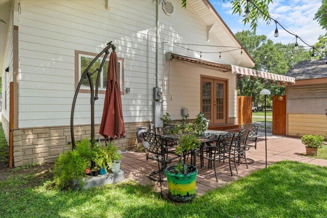 406 Garwood St, Smithville, TX 78957 - view of patio featuring french doors