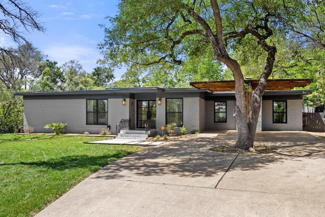 104 Westhaven Dr, West Lake Hills, TX 78746 - mid-century inspired home with driveway and brick siding