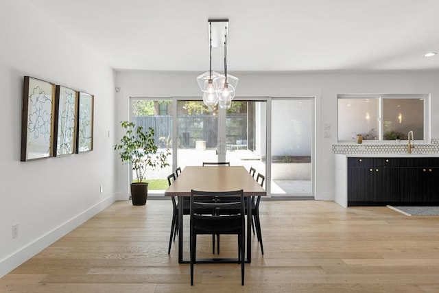 104 Westhaven Dr, West Lake Hills, TX 78746 - dining room with light wood finished floors and a chandelier