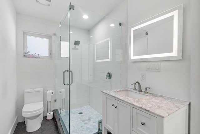 104 Westhaven Dr, West Lake Hills, TX 78746 - bathroom featuring a stall shower, vanity, tile patterned floors, and recessed lighting