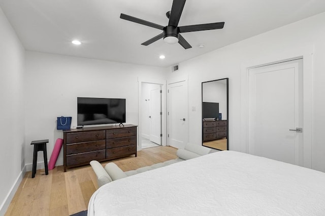 104 Westhaven Dr, West Lake Hills, TX 78746 - bedroom with wood finished floors, recessed lighting, two closets, and ceiling fan
