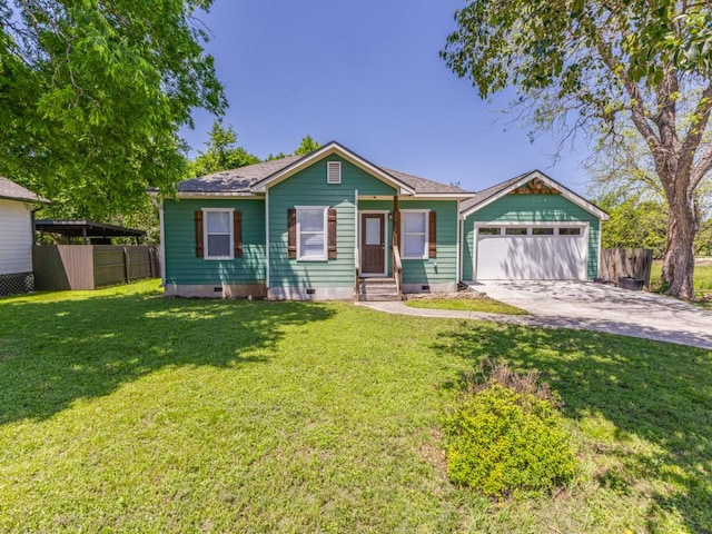view of front of property featuring a garage, driveway, crawl space, and fence