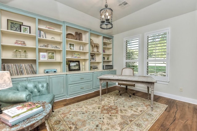 office with visible vents, baseboards, a notable chandelier, and dark wood-style floors