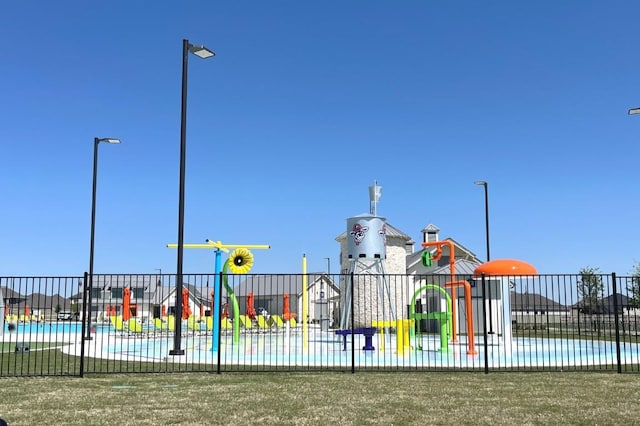 community play area featuring fence