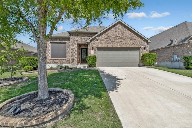 3613 Esperanza Dr, Round Rock, TX 78665 - view of front of house featuring brick siding, an attached garage, a front yard, concrete driveway, and roof with shingles