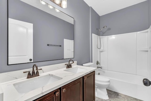 3613 Esperanza Dr, Round Rock, TX 78665 - bathroom featuring toilet, double vanity, and  shower combination