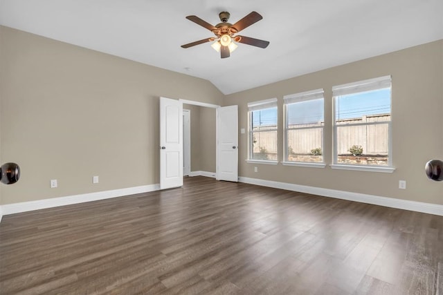 3613 Esperanza Dr, Round Rock, TX 78665 - empty room featuring dark wood-style floors, baseboards, lofted ceiling, and a ceiling fan