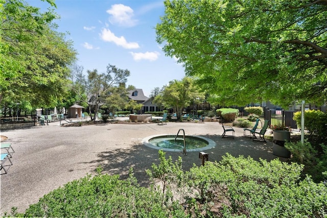 11203 Ranch Road 2222 1105, Austin, TX 78730 - view of home's community featuring a hot tub and a patio area