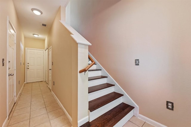 11203 Ranch Road 2222 1105, Austin, TX 78730 - stairway featuring tile patterned flooring and baseboards
