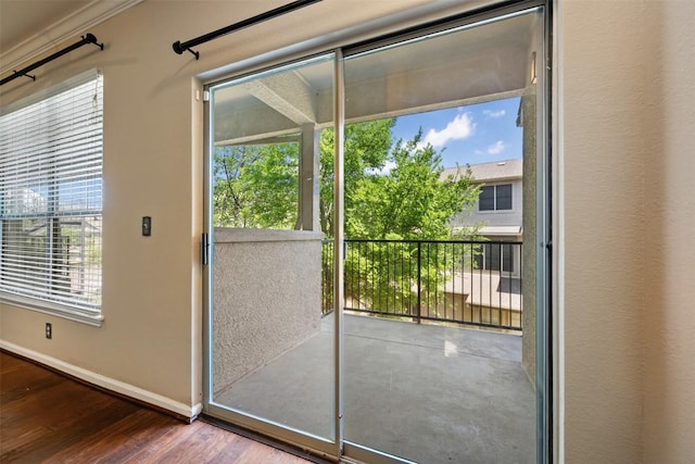 11203 Ranch Road 2222 1105, Austin, TX 78730 - doorway to outside with baseboards and wood finished floors