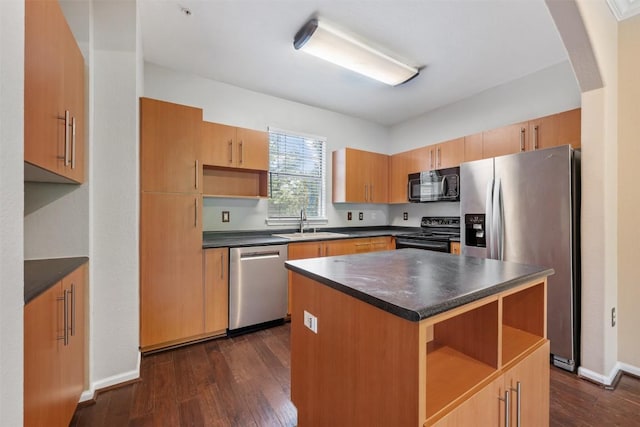 kitchen featuring open shelves, dark countertops, dark wood-type flooring, appliances with stainless steel finishes, and a sink