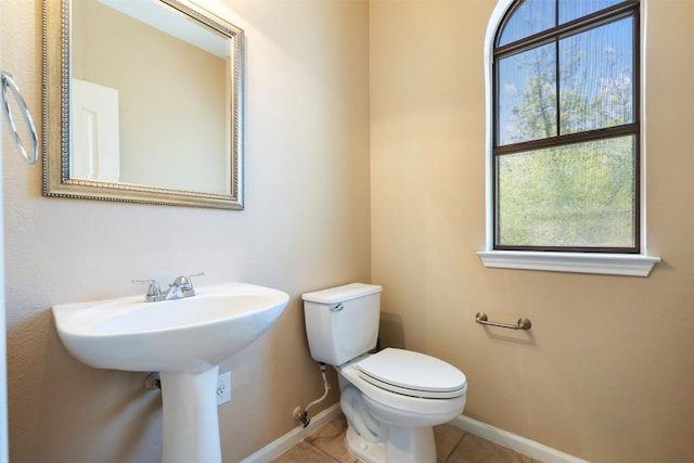 11203 Ranch Road 2222 1105, Austin, TX 78730 - half bathroom featuring plenty of natural light and tile patterned floors