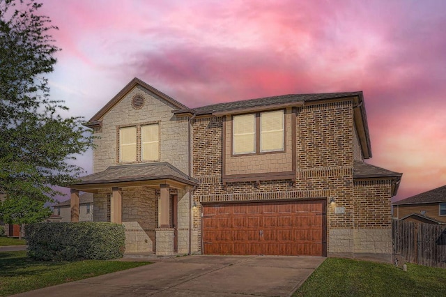 1161 Verna Brooks Way, Kyle, TX 78640 - view of front of property with a garage, stone siding, concrete driveway, and a shingled roof