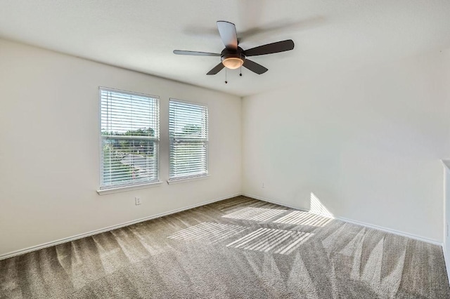 1161 Verna Brooks Way, Kyle, TX 78640 - unfurnished room featuring carpet floors, a ceiling fan, and baseboards
