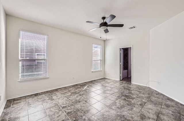 1161 Verna Brooks Way, Kyle, TX 78640 - unfurnished room with ceiling fan and baseboards